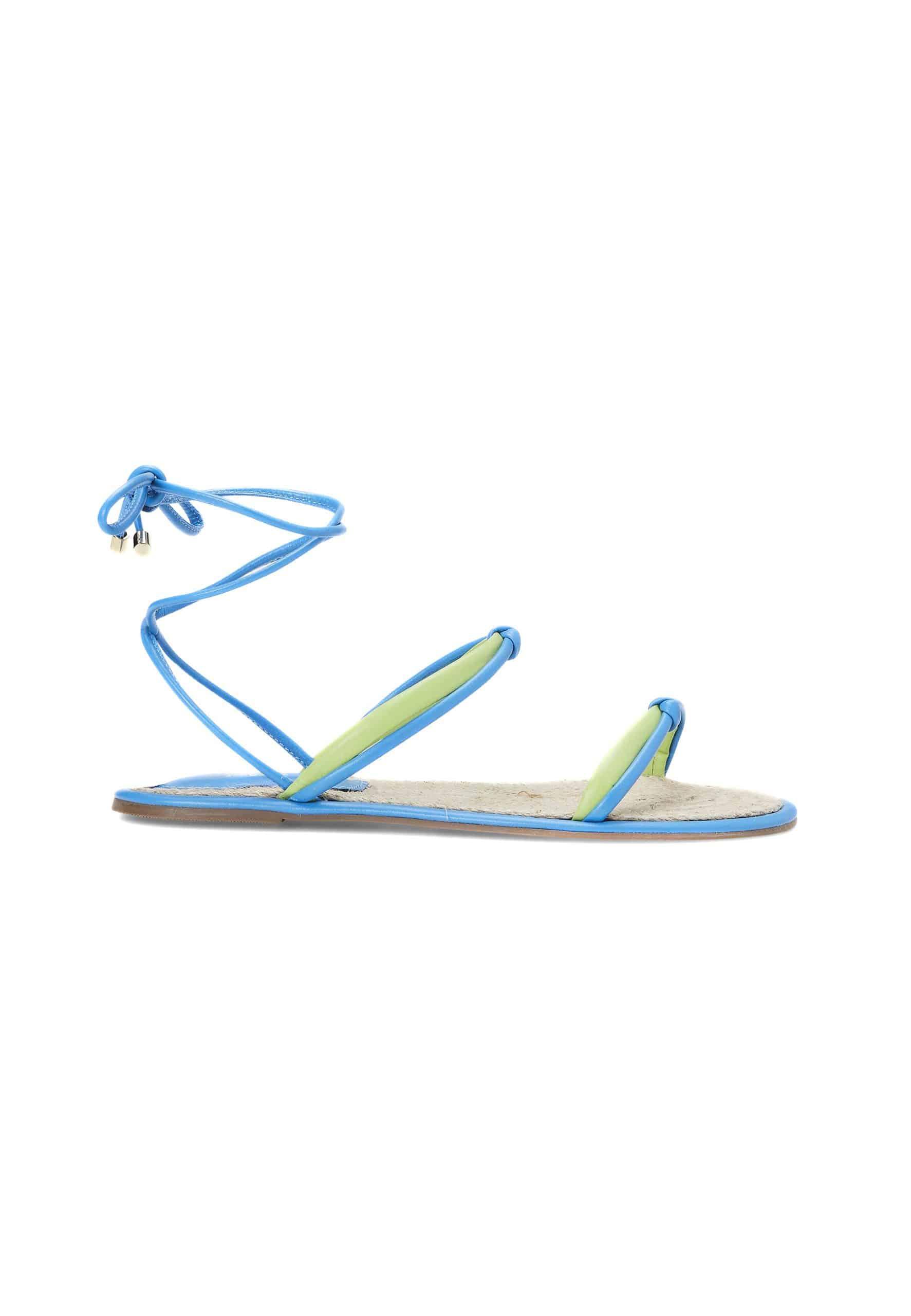 Elegant leather lace-up sandals in pink and blue. Flat, strappy, open-toe design for comfort and style. Perfect summer, vacation, and casual wear